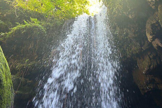 Charco Azul, Hidden Caves, Waterfalls, Beach, Free Adult Drinks - A 5.5-Hour San Juan Day That Mixes Canyons, Caves, and Beach Time