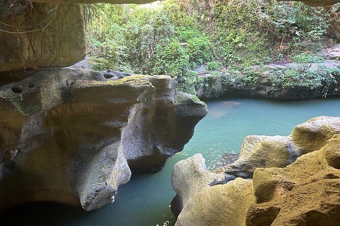 Charco Azul, Hidden Caves, Waterfalls, Beach, Free Adult Drinks - Pickup at Plaza Loíza Norte: How the Day Actually Starts
