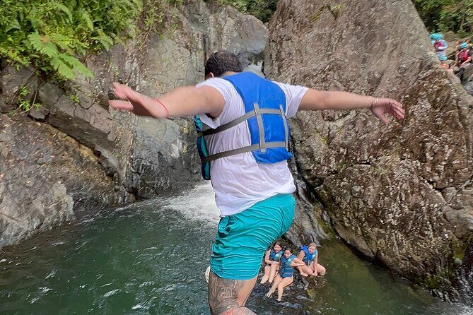 El Yunque Exclusive Experience: Waterslide Adventures w/Transport - Waterfall and Slide Time: Life Jackets, Rope Swing, and Cliff Jump