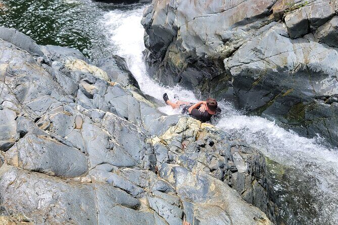 El Yunque Rainforest - Waterslide, Cliff jump, and Rope swing! - The 25-minute rainforest hike: short enough to feel fun, muddy enough to earn laughs
