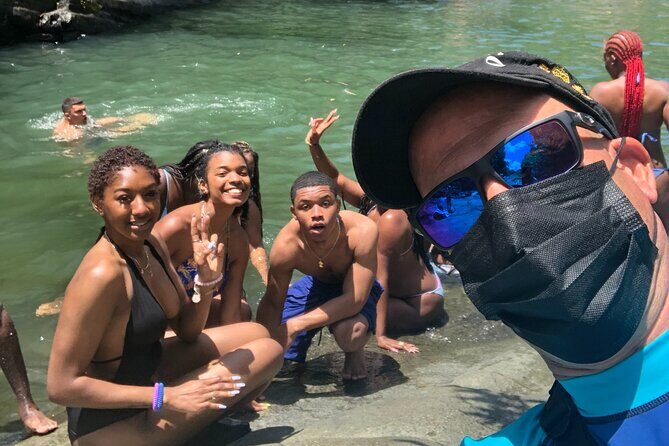 Epic Guided Adventure in El Yunque National Rainforest & Beach - Luquillo Beach: where you recharge after the muddy part