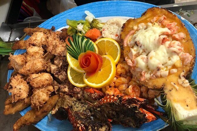Private El Yunque Waterslides and Luquillo Beach Tour - Stop 2: Luquillo Beach for calm water and kiosk lunch