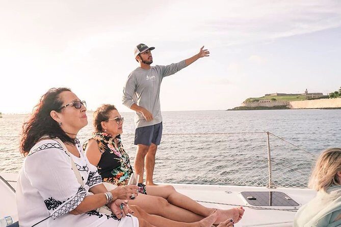 San Juan Catamaran Sunset Sail with Drinks Included - San Juan at golden hour from a 37-foot catamaran