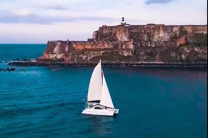San Juan Catamaran Sunset Sail with Drinks Included - Drinks on deck: rum punch, sparkling wine, and the right kind of calm