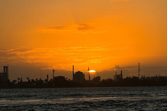 San Juan Sunset Harbor Boat Ride - The party-plus-cruise vibe: drinks, rum punch, and what you actually eat