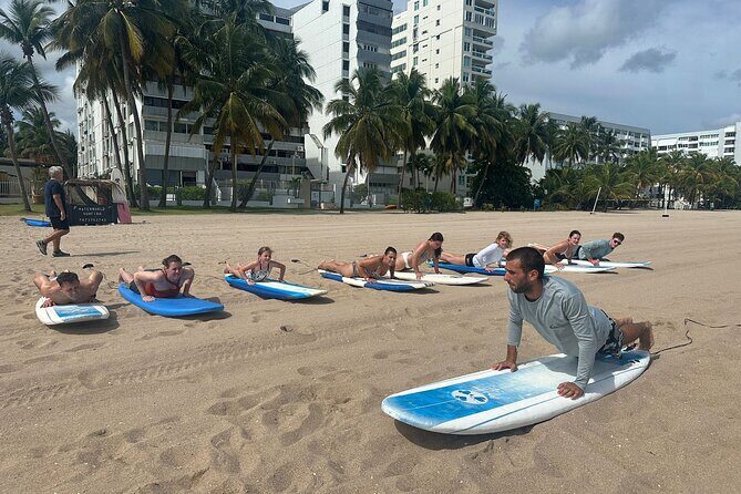San Juan Surfing Lessons: Ride the Waves in Puerto Rico - Surf Lesson Flow in San Juan: Sand basics, then coached waves