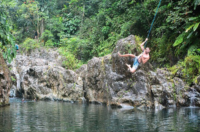 Small-Group El Yunque Rainforest Vivid Day Tour with Transport - First Pool Stop: Swim Time, Water Slide Fun, and Safety Gear