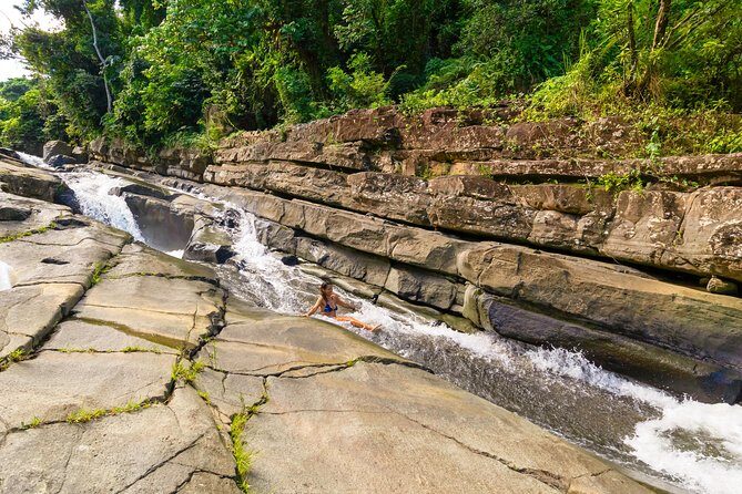 Yunque Rainforest River Rope Swing with Waterslide and Beach Tour - Luquillo beach time: the ocean reset after river fun